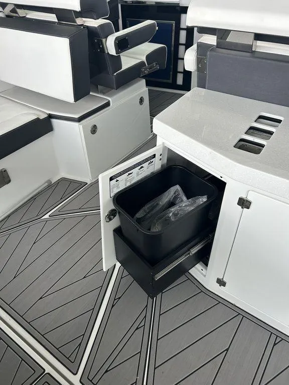Slide: The Image of 2023 Monterey 378SS boat interior with storage compartment and sleek design. - 45