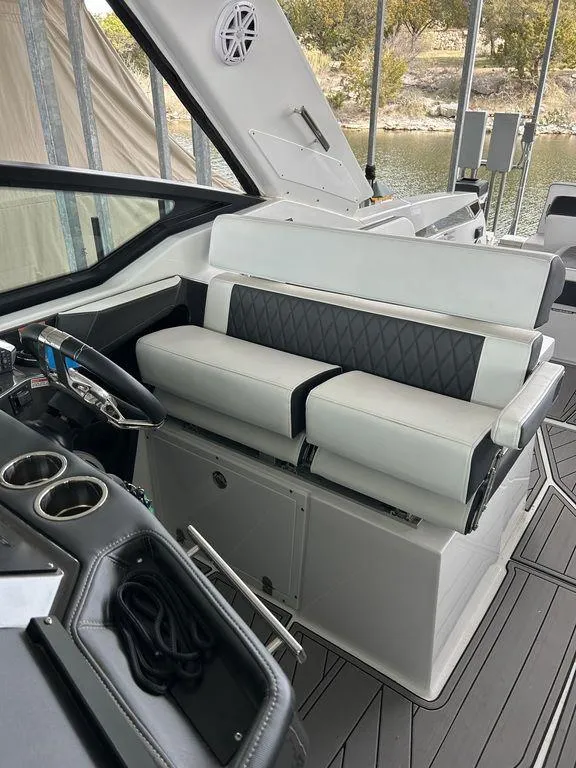 Slide: The Image of 2023 Monterey 378SS Super Sport boat with spacious seating and sleek design. - 28