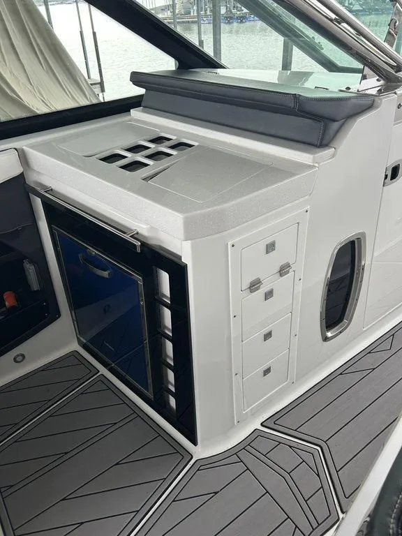 Slide: The Image of 2023 Monterey 378SS boat anchor compartment with chain and rope storage. - 35