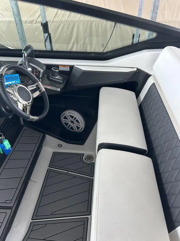 Slide: The Image of 2023 Monterey 378SS boat interior with modern seating and sleek design. - 36