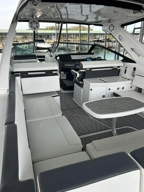 Slide: The Image of 2023 Monterey 378SS boat interior with storage compartment and sleek design. - 43