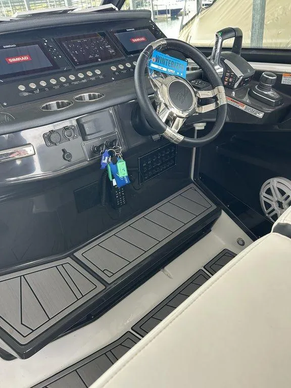 Slide: The Image of 2023 Monterey 378SS boat interior with modern bathroom design and sleek cabinetry. - 54