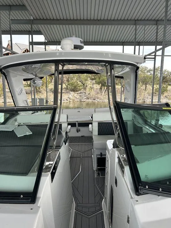 Slide: The Image of 2023 Monterey 378SS cabin interior with white seating and modern design. - 58