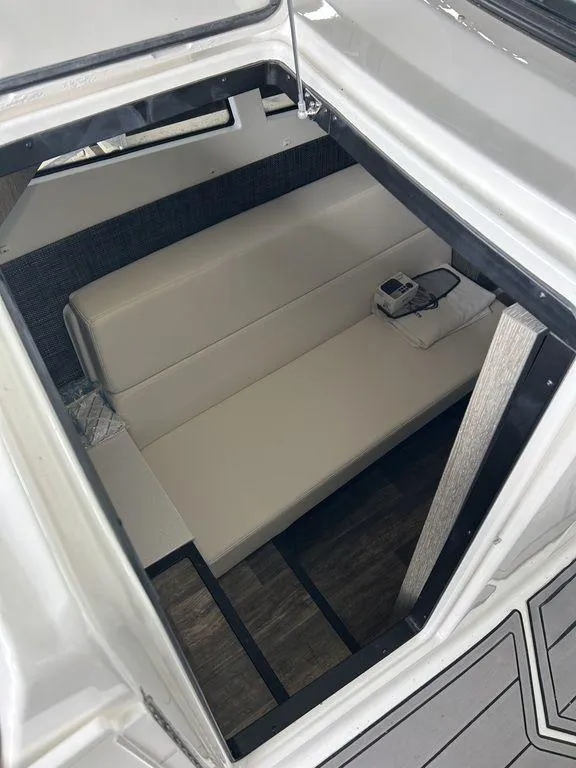 Slide: The Image of 2023 Monterey 378SS boat docked in a covered marina. - 9