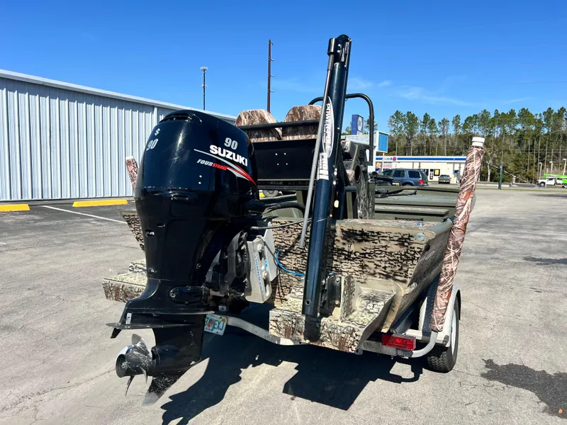 Slide: The Image of 2012 SeaArk 1872 boat with Suzuki 90 outboard motor on trailer. - 6