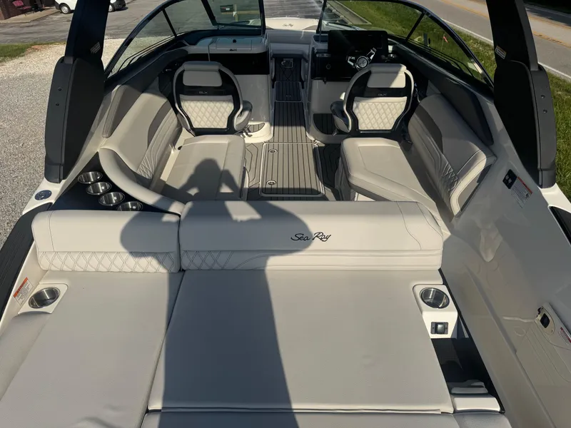Slide: The Image of 2025 Sea Ray SLX 260 boat interior with luxurious seating and modern design. - 7