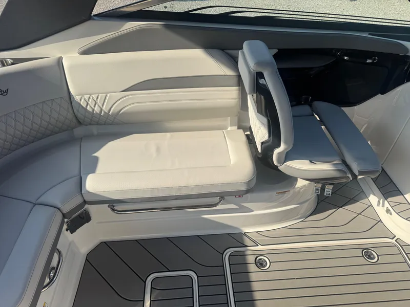 Slide: The Image of 2025 Sea Ray SLX 260 interior with luxurious seating and modern design. - 9