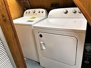 Slide: The Image of Laundry area with washer and dryer on an offshore supply vessel, 2002 model. - 12