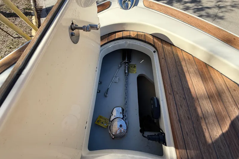 Slide: The Image of 2022 Chris-Craft Catalina 30 anchor locker with teak decking and stainless steel fittings. - 17