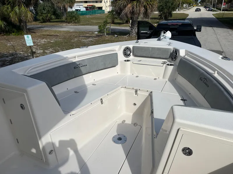 Slide: The Image of 2025 Sea Chaser 30 HFC CC boat interior with spacious seating and modern design. - 9