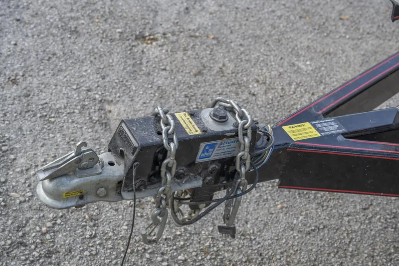 Slide: The Image of Trailer hitch with chains for 2007 Correct Craft Air Nautique 226 LE boat. - 16