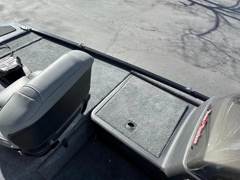 Slide: The Image of 2021 Tracker Bass Tracker Classic XL boat interior with seating and storage. - 18