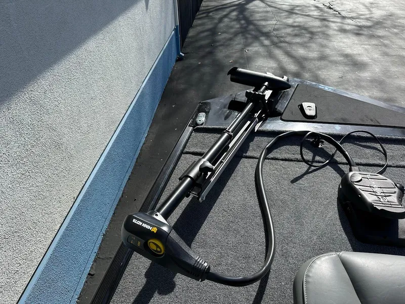 Slide: The Image of 2021 Tracker Bass Tracker Classic XL with trolling motor on deck. - 21