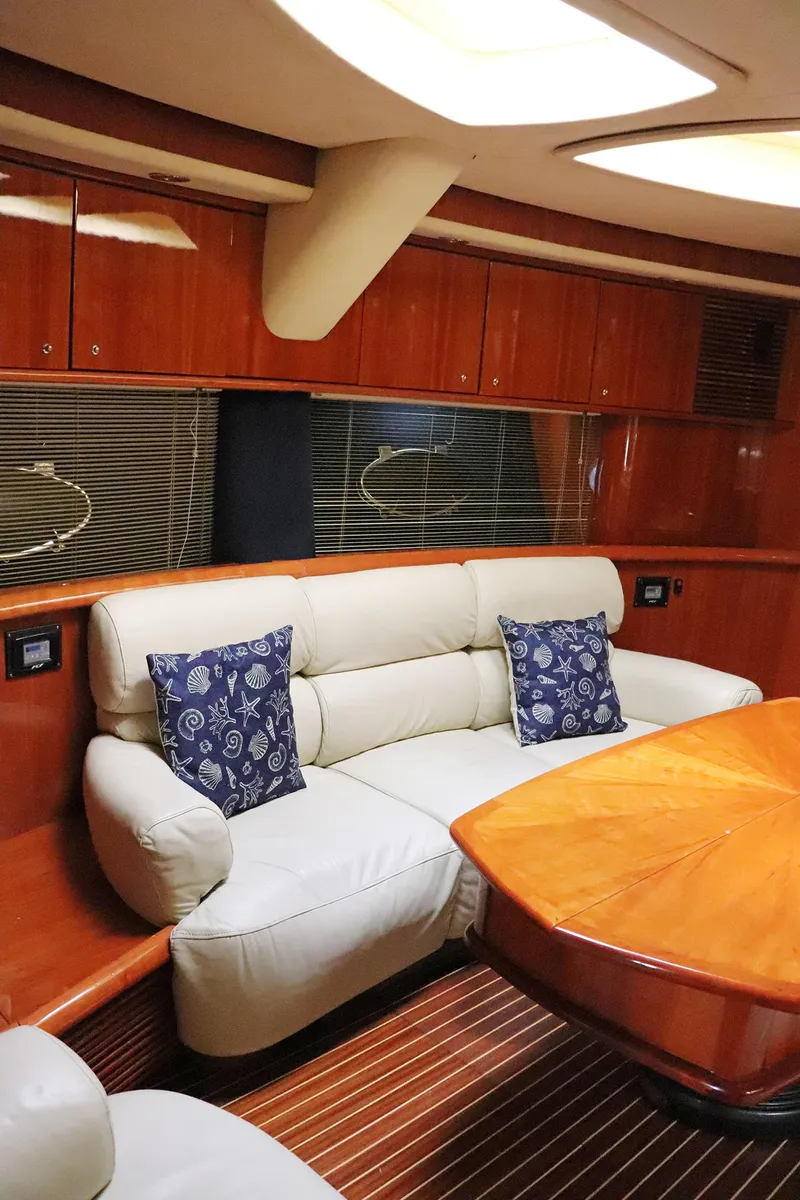 Slide: The Image of Cockpit of 2000 Sunseeker Predator 74 yacht with modern navigation equipment and steering wheel. - 29