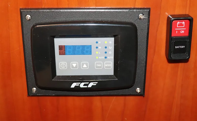 Slide: The Image of Tablet mounted on a Sunseeker Predator 74 yacht dashboard, displaying time 10:03. - 35