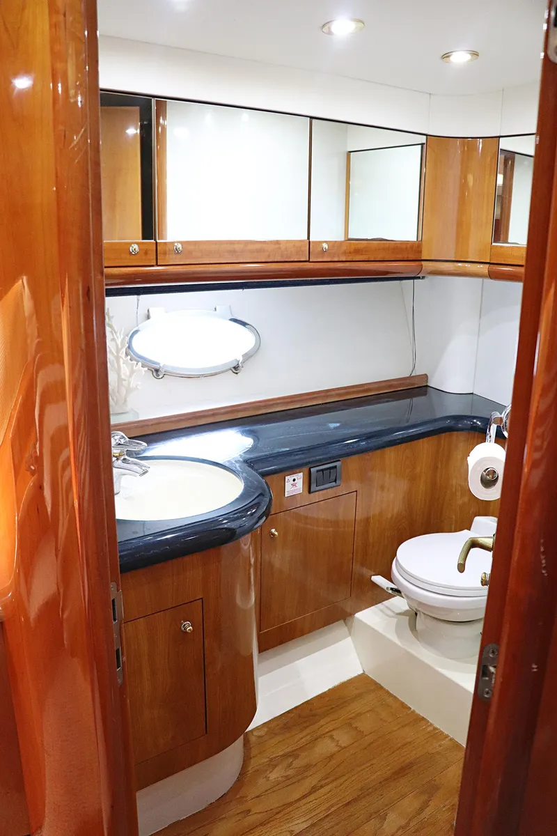 Slide: The Image of Luxurious interior of 2000 Sunseeker Predator 74 yacht with elegant seating and wooden finishes. - 39