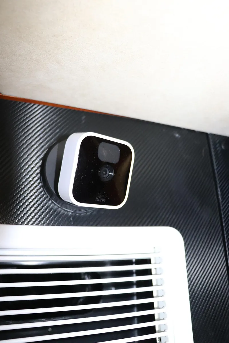 Slide: The Image of Microwave and ice bucket in Sunseeker Predator 74 yacht's wooden cabinet, 2000 model. - 60