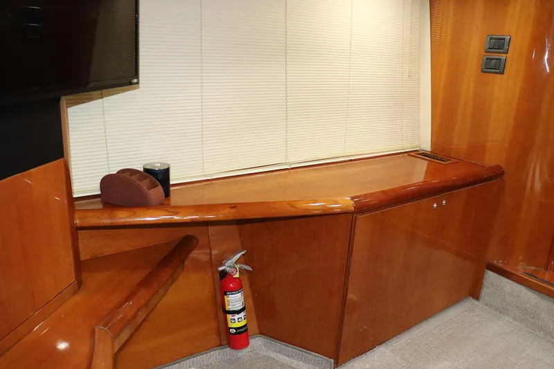 Slide: The Image of Interior of 2000 Sunseeker Predator 74 yacht with nautical-themed bedding. - 62