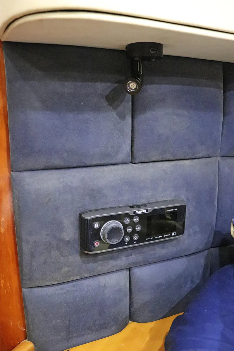 Slide: The Image of Luxurious cabin interior of 2000 Sunseeker Predator 74 yacht with nautical-themed bedding. - 63