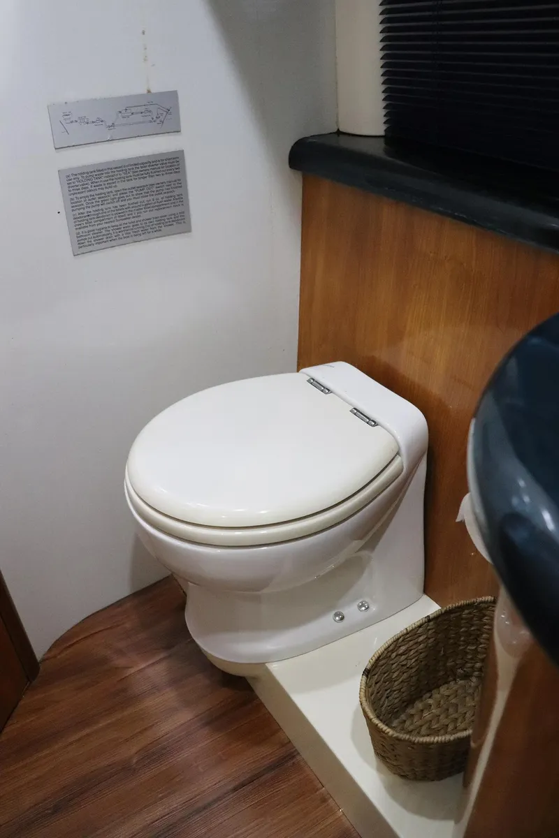 Slide: The Image of Luxurious bedroom interior of 2000 Sunseeker Predator 74 yacht with striped bedding. - 65