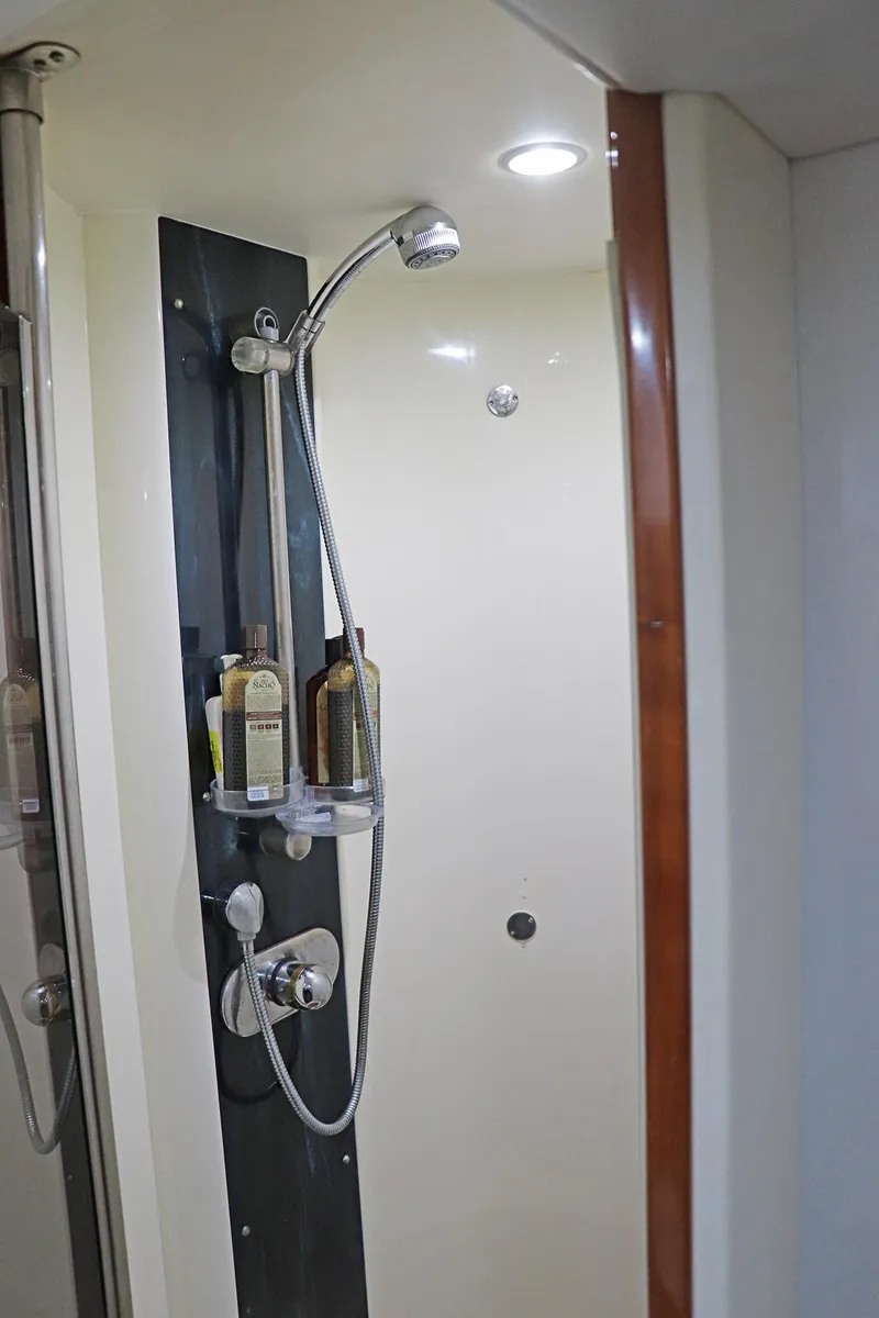 Slide: The Image of Luxurious cabin interior of a 2000 Sunseeker Predator 74 yacht with elegant wood finishes. - 66