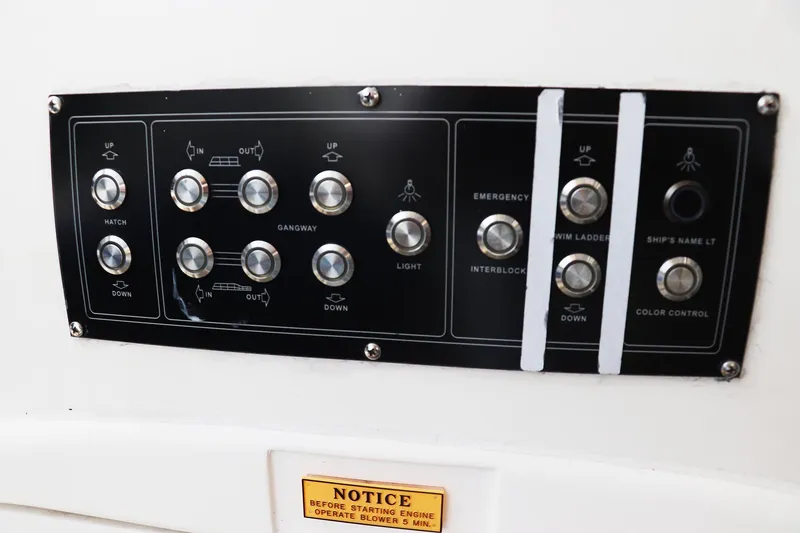 Slide: The Image of Red fire extinguisher mounted on a Sunseeker Predator 74 yacht, 2000 model. - 70