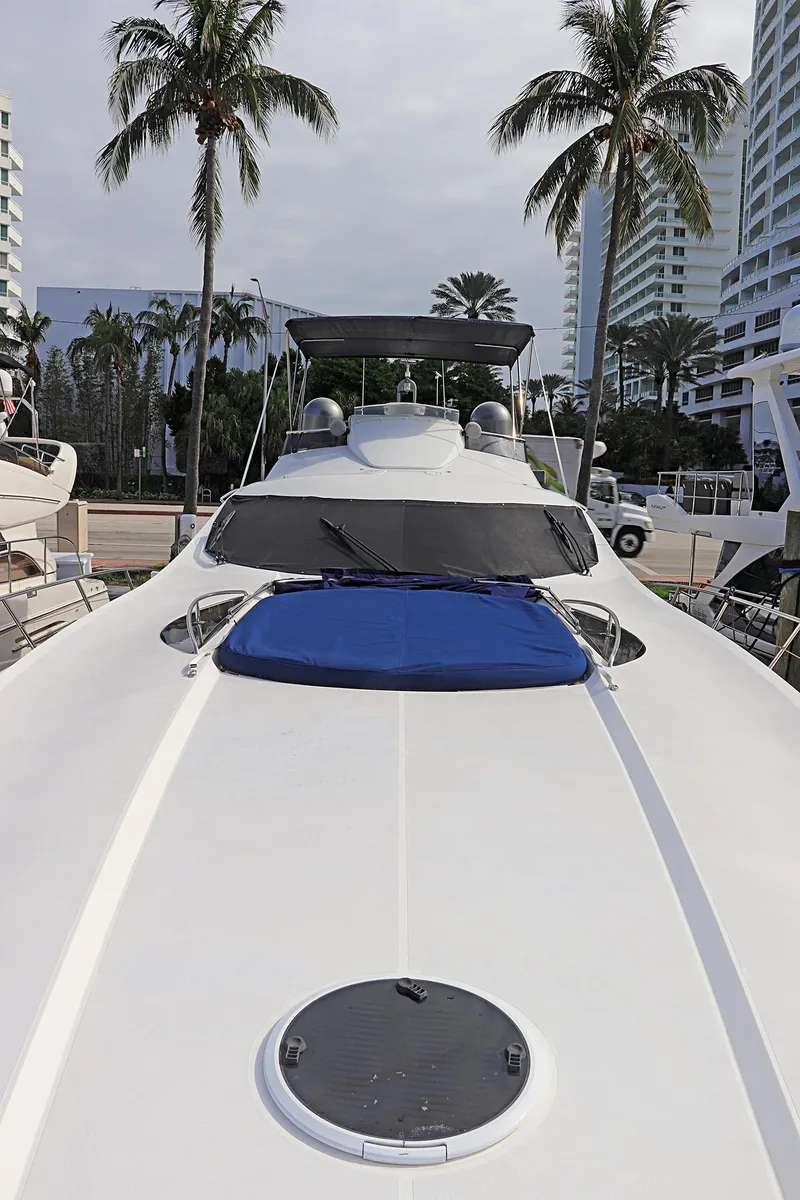 Slide: The Image of Interior detail of a 2000 Sunseeker Predator 74 yacht, featuring a mounted fan. - 77