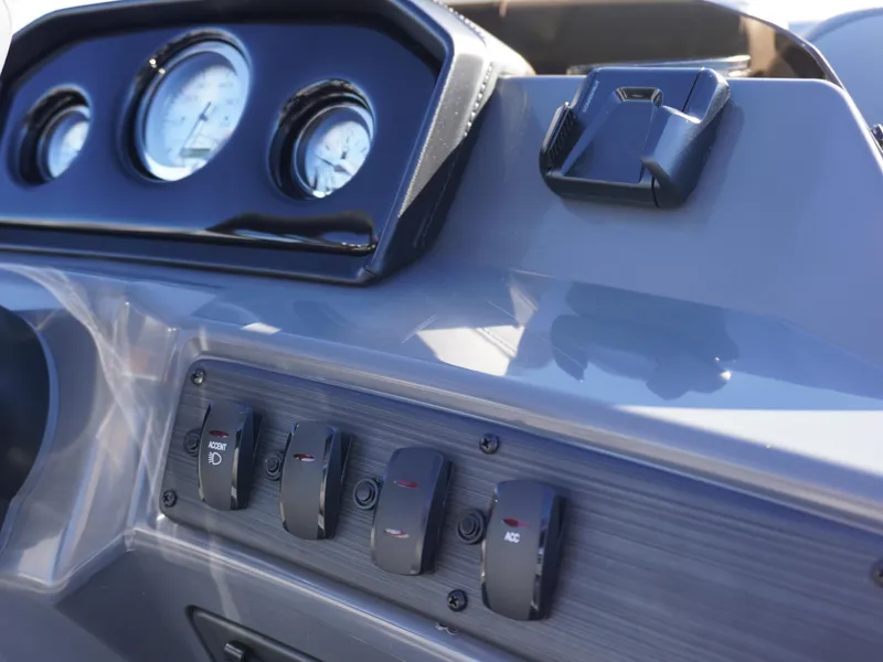 Slide: The Image of Dashboard of 2025 Bennington 20 SSB boat with gauges and switches. - 12