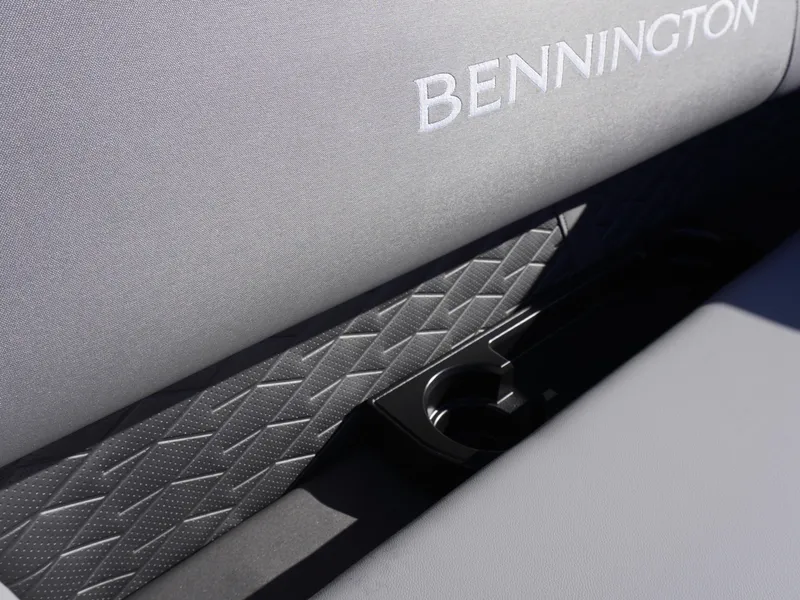 Slide: The Image of 2025 Bennington 20 SSB boat seat with textured design and cup holder. - 16
