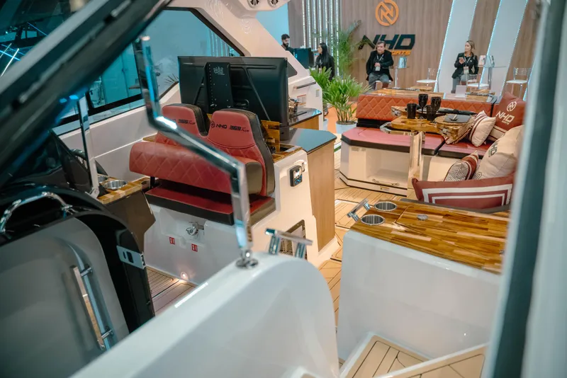 Slide: The Image of Interior of 2025 NHD 365 HT PLUS yacht, featuring luxurious seating and modern design. - 12
