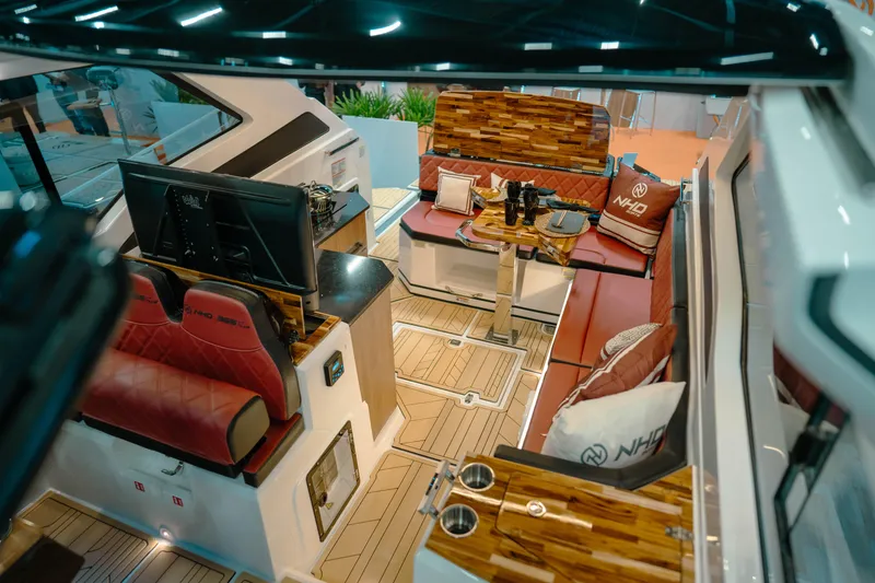 Slide: The Image of Luxurious interior of 2025 NHD 365 HT PLUS yacht with elegant seating and modern amenities. - 13