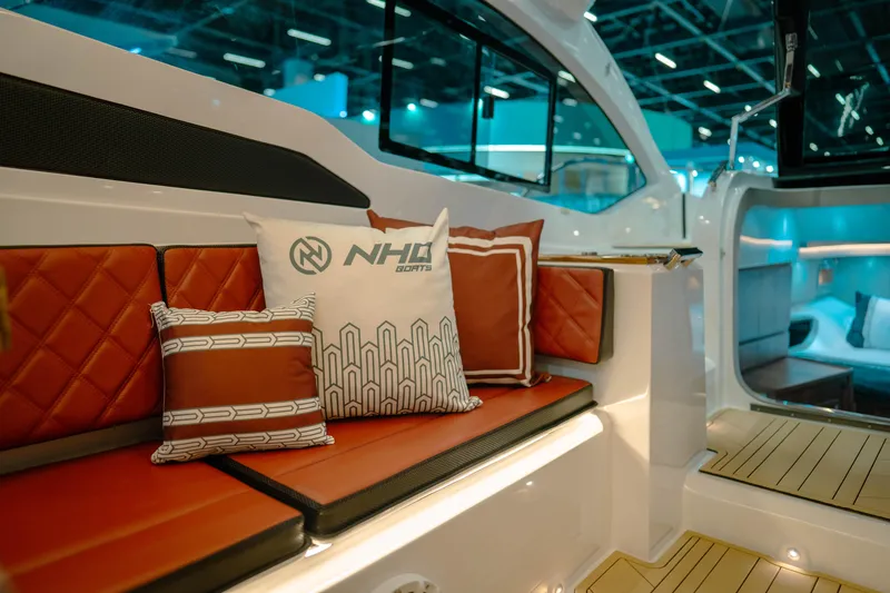 Slide: The Image of Luxurious interior of 2025 NHD 365 HT PLUS yacht with stylish cushions and seating. - 17
