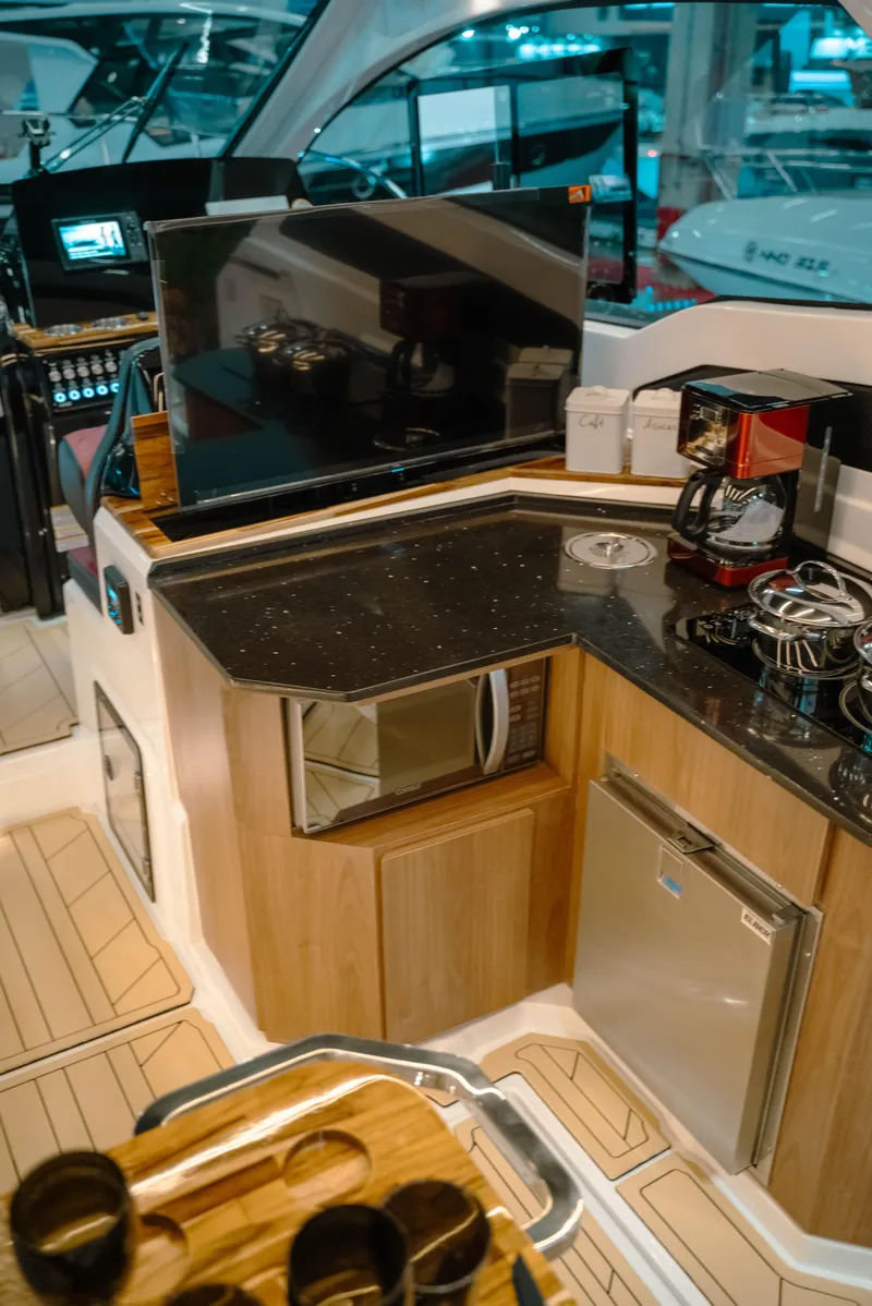 Slide: The Image of Modern kitchen area on 2025 NHD 365 HT PLUS yacht with appliances and sleek design. - 20