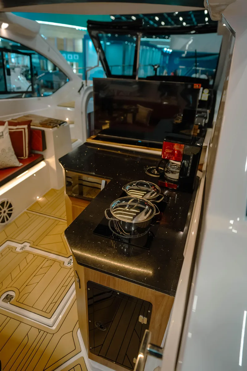 Slide: The Image of Luxury interior of 2025 NHD 365 HT PLUS yacht with modern kitchen amenities. - 21
