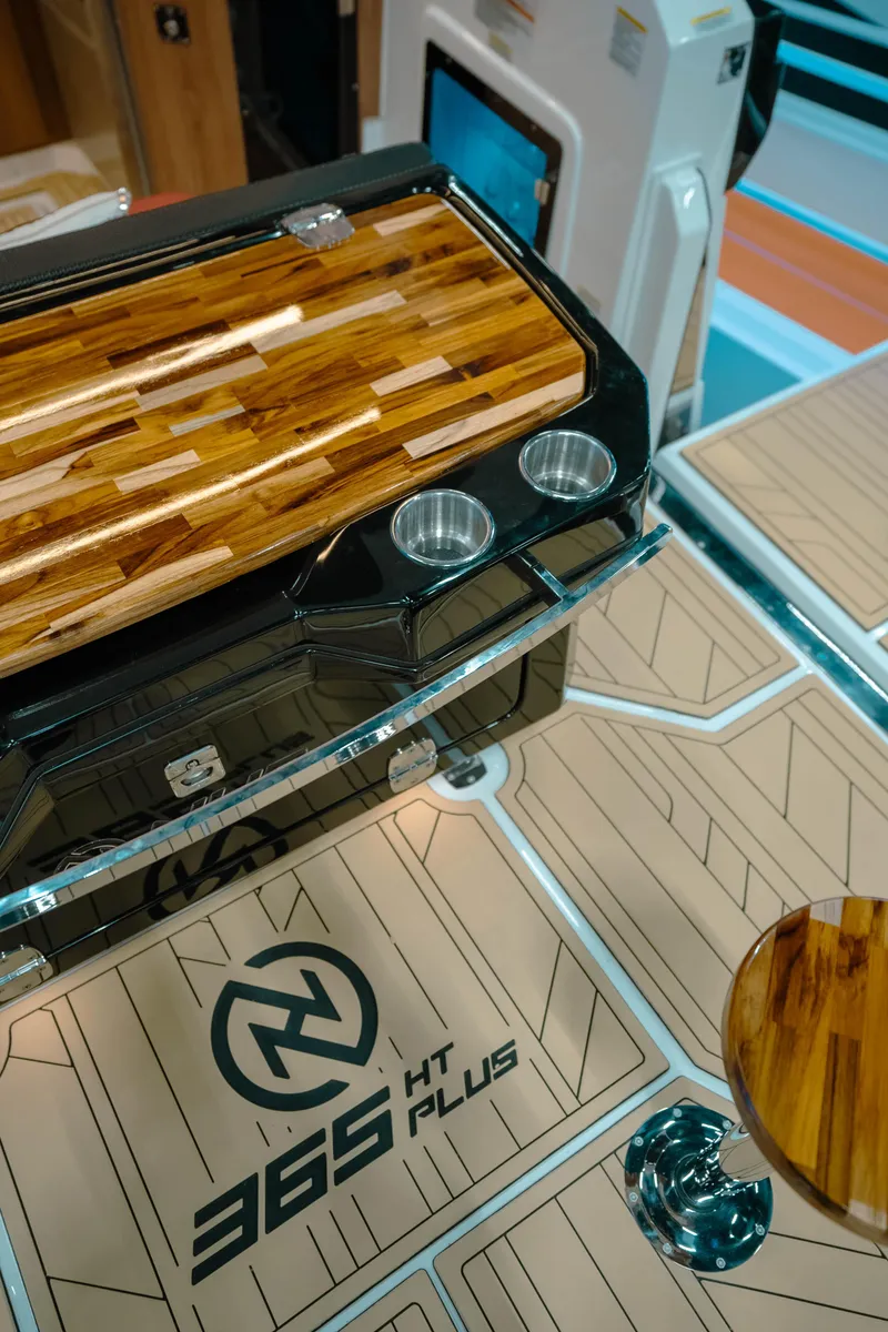 Slide: The Image of NHD 365 HT PLUS 2025 model with sleek wood finish and modern design elements. - 22