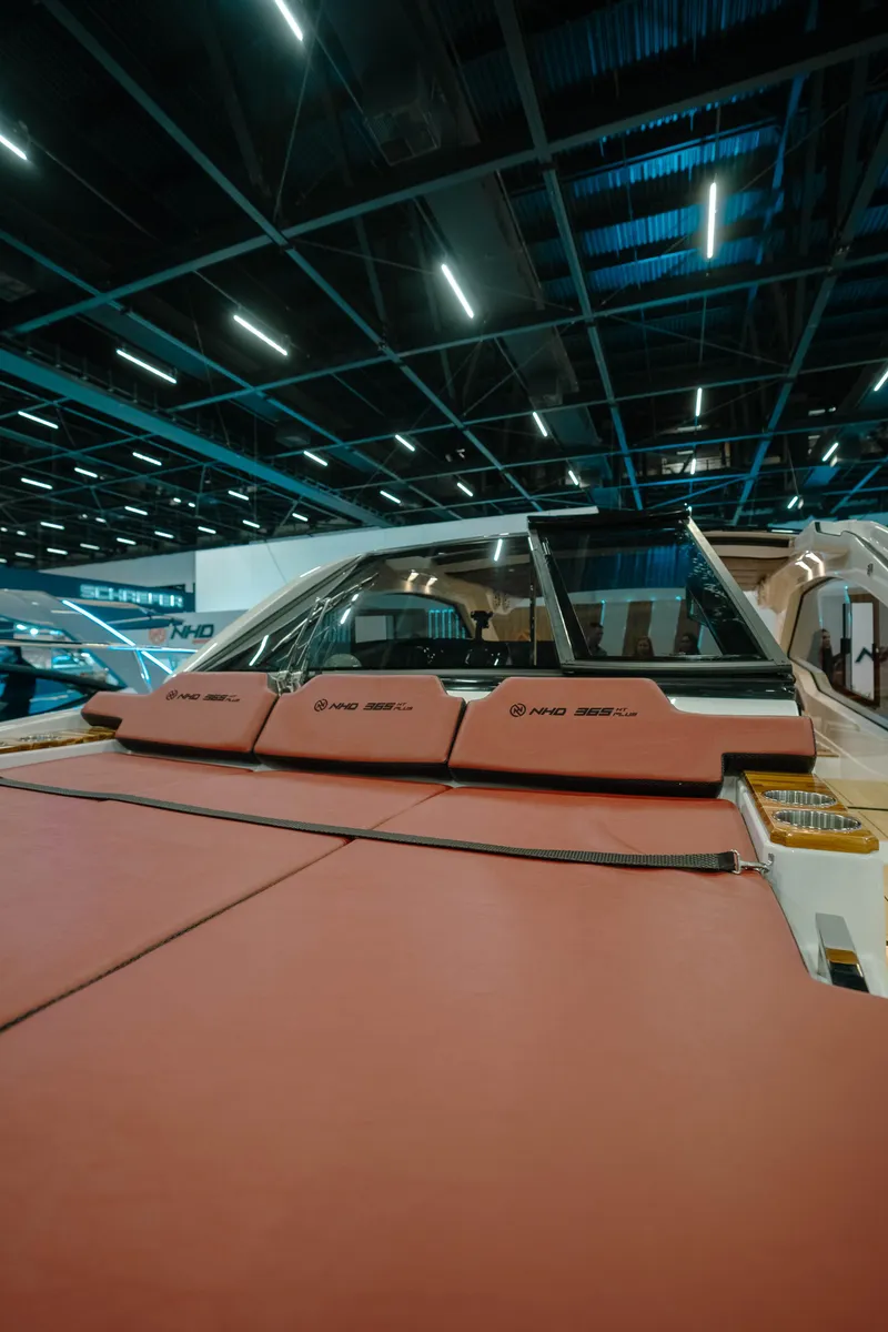 Slide: The Image of 2025 NHD 365 HT PLUS luxury yacht interior with modern design and comfortable seating. - 26