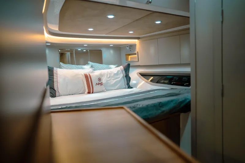 Slide: The Image of Luxurious interior of 2025 NHD 365 HT PLUS yacht cabin with modern lighting. - 29