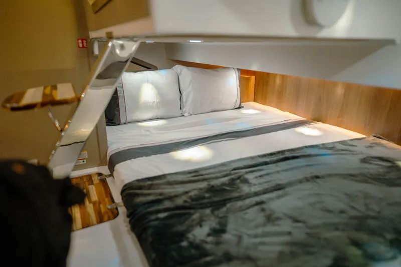 Slide: The Image of Luxurious bed inside NHD 365 HT PLUS 2025 model, featuring modern design and cozy bedding. - 30