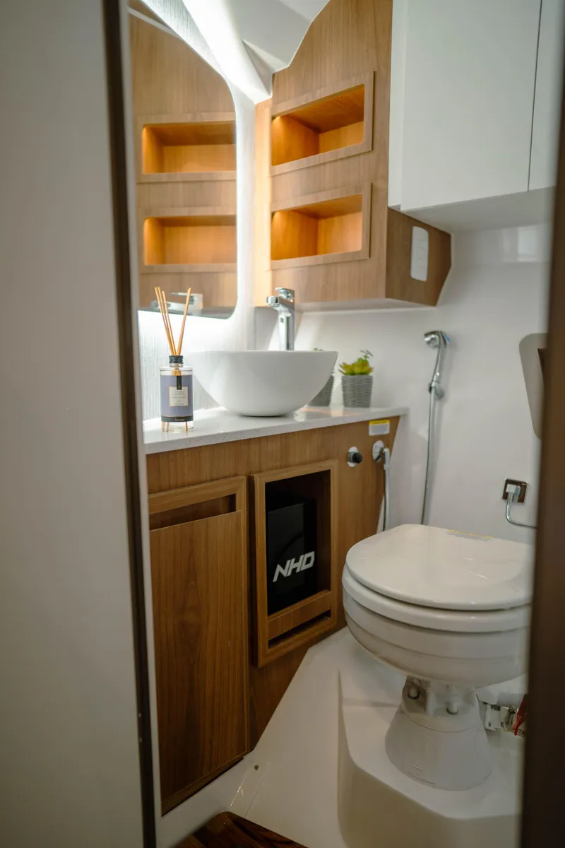 Slide: The Image of Modern bathroom in 2025 NHD 365 HT PLUS yacht with wooden cabinetry and sleek fixtures. - 32