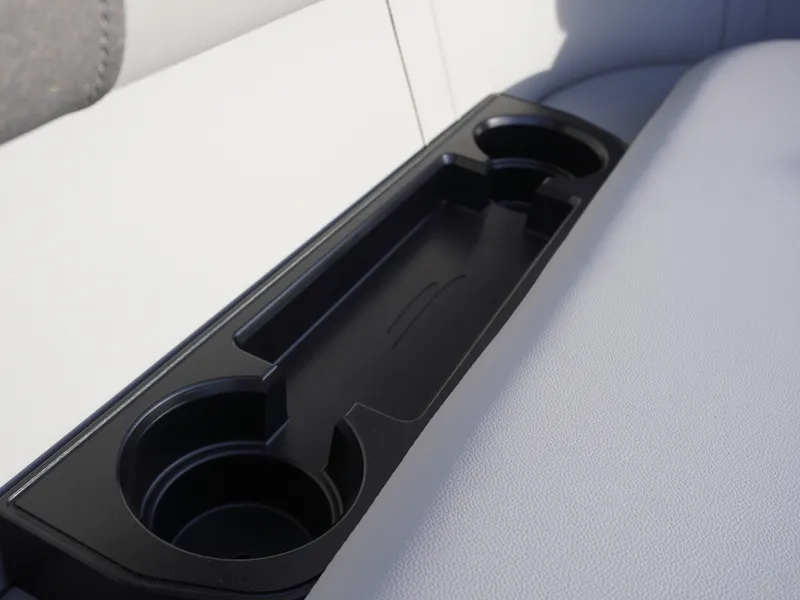Slide: The Image of Cup holder on Bennington 22 SVSB 2025 boat seat, featuring sleek black design. - 10