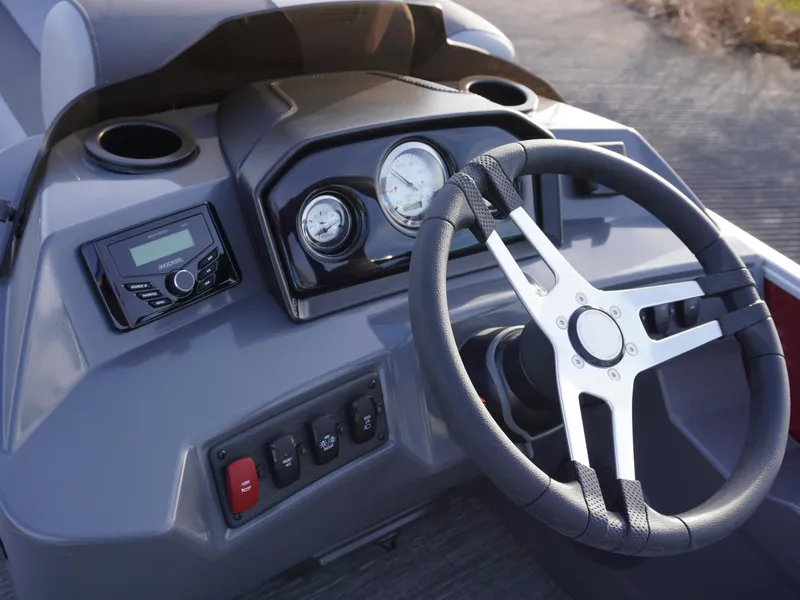 Slide: The Image of Steering console of 2025 Bennington 22 SVSB boat with modern controls and gauges. - 14