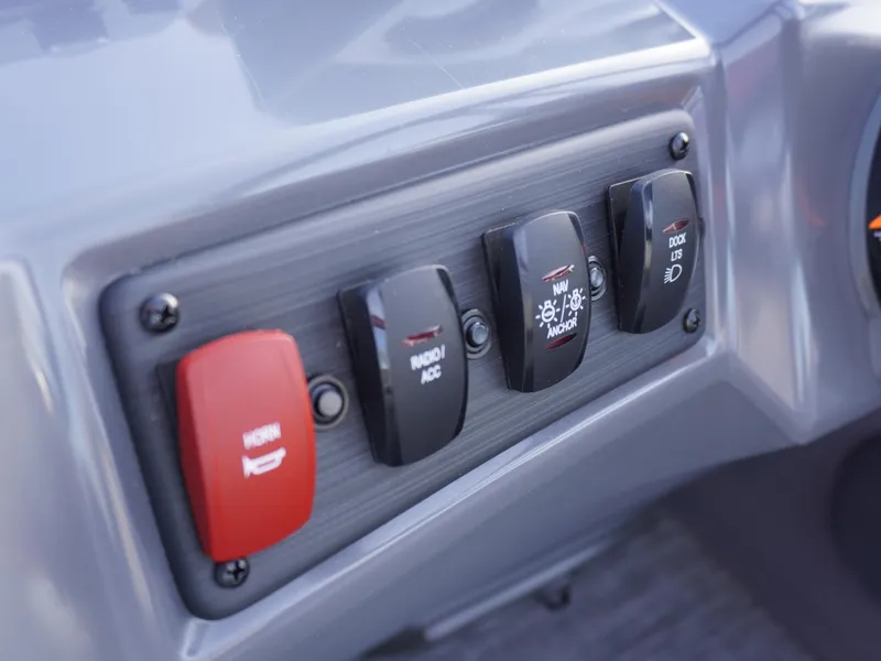 Slide: The Image of Dashboard switches on a 2025 Bennington 22 SVSB boat. - 16