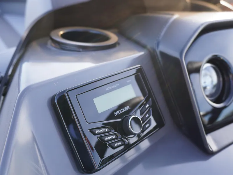 Slide: The Image of 2025 Bennington 22 SVSB boat dashboard with Kicker audio system. - 17