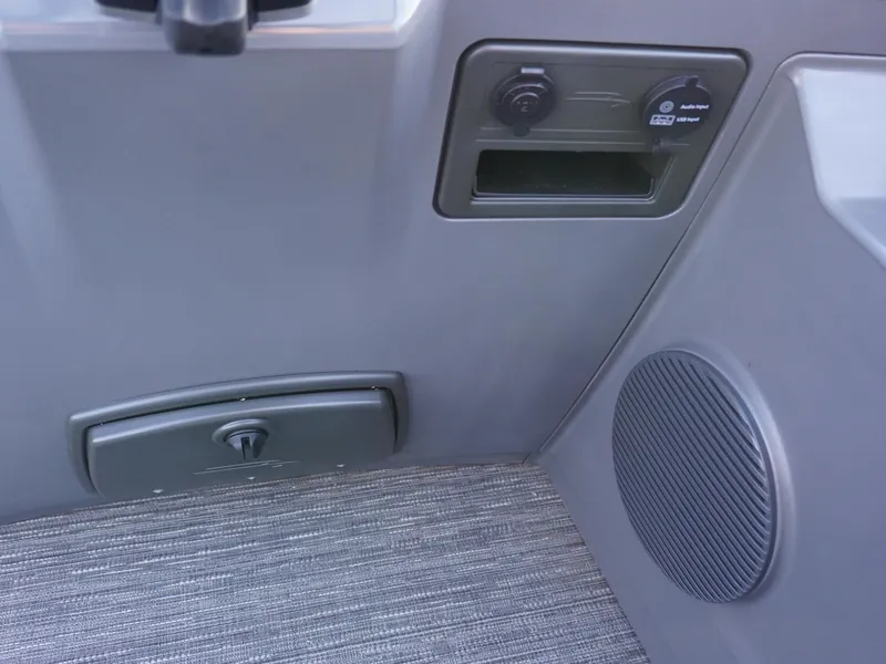 Slide: The Image of Interior of 2025 Bennington 22 SVSB boat, featuring control panel and speaker. - 18