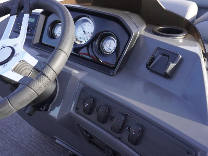 Slide: The Image of Dashboard of 2025 Bennington 22 SVSB boat with steering wheel and gauges. - 19