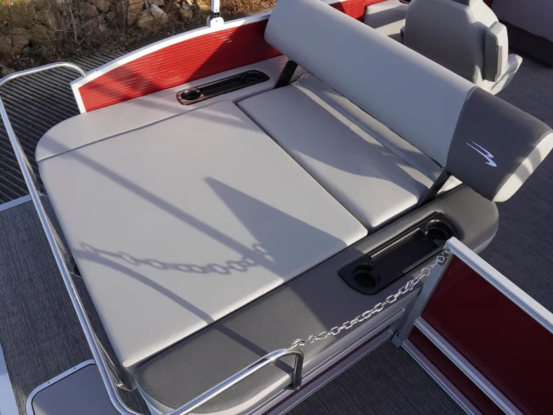 Slide: The Image of 2025 Bennington 22 SVSB boat with gray seating and red accents. - 21