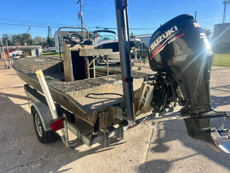 Slide: The Image of 2015 Gator Trax 18 boat with Suzuki 90 outboard motor on trailer. - 3