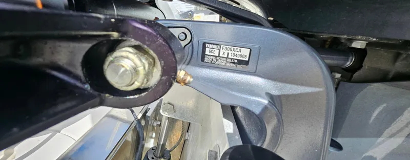 Slide: The Image of Close-up of a 2018 Robalo 246 Cayman boat engine component. - 15