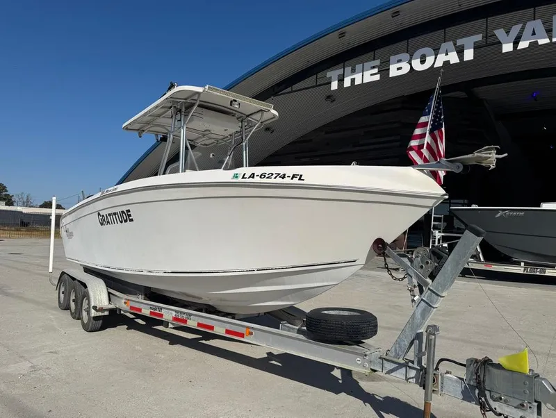 Slide: The Image of 2005 Sea Chaser 2600 CC boat on trailer, parked outside The Boat Yard. - 12
