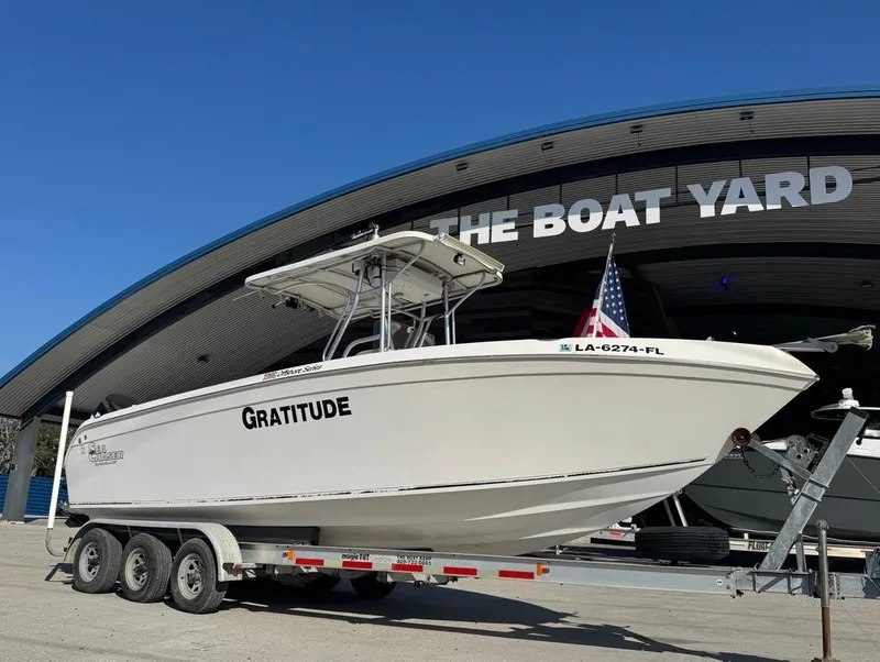 Slide: The Image of 2005 Sea Chaser 2600 CC boat named "Gratitude" on a trailer at The Boat Yard. - 13